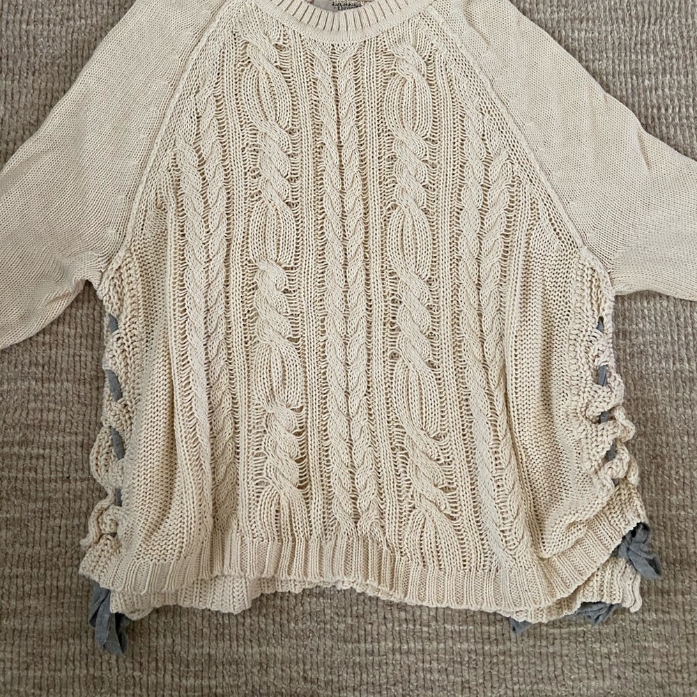 Label and Thread cable side tie sweater